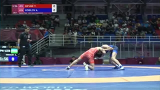 1/4 FS - 51 kg: T. KIFUNE (JPN) v. A. KOBILOV (UZB)