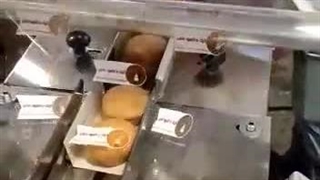 دستگاه بسته بندی کلوچه به همراه کاغذ گذار