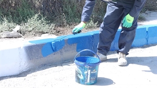 رنگ آمیزی جداول شهر قشم